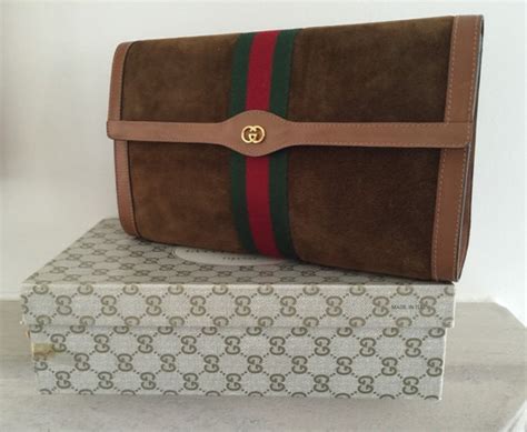 gucci aria clutch|Gucci vintage suede clutch.